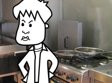 Tim standing next to the cooker in the cafe