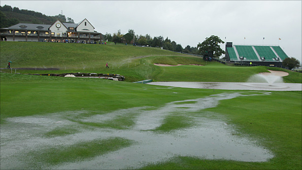 The 18th hole of the Celtic Manor course is submerged in standing water on Sunday morning 