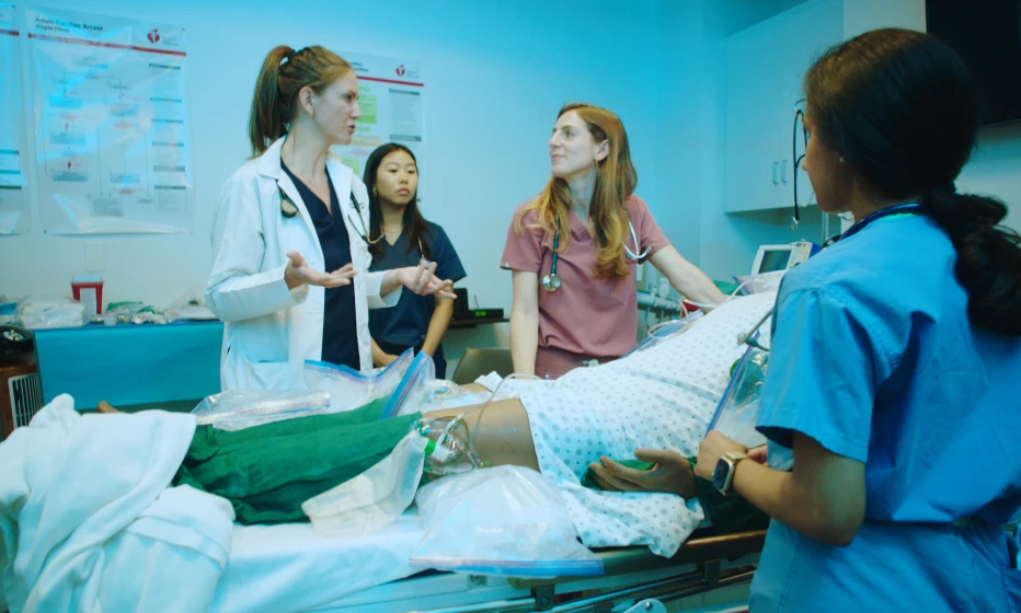 A group in a hospital room.